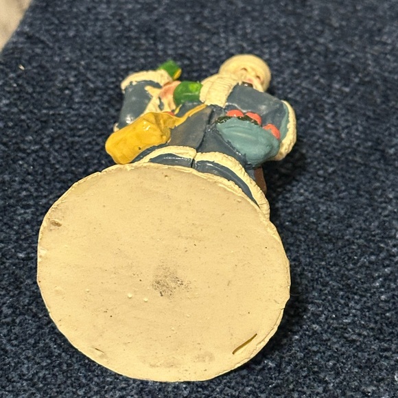 Blue robed Santa with green mittens holds a doll & basket of fruit. - Picture 5 of 7